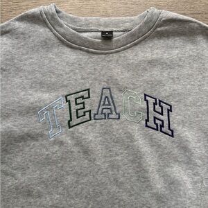 'TEACH' Embroidered Sweatshirt